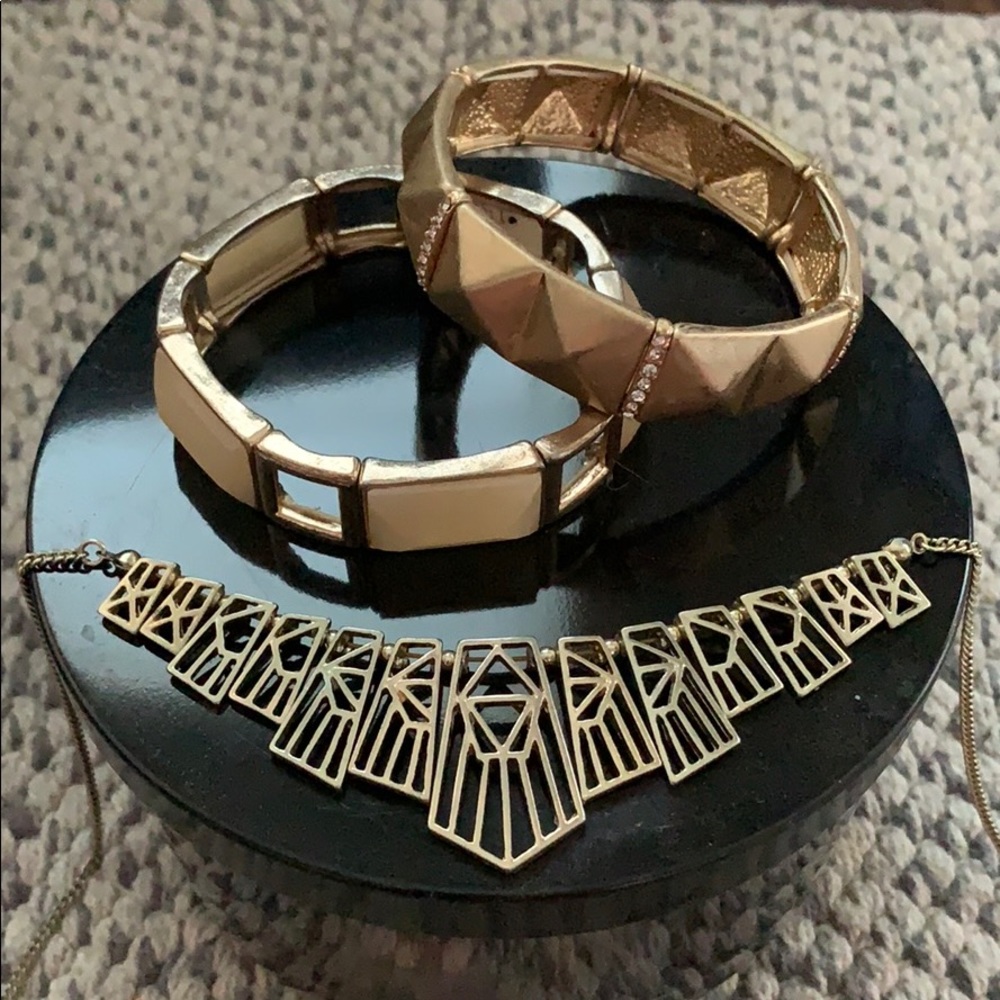Two adjustable bracelets and necklace